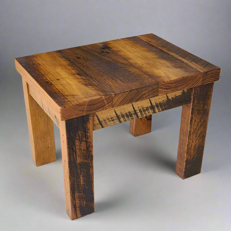 Wooden stool with a rustic finish 
