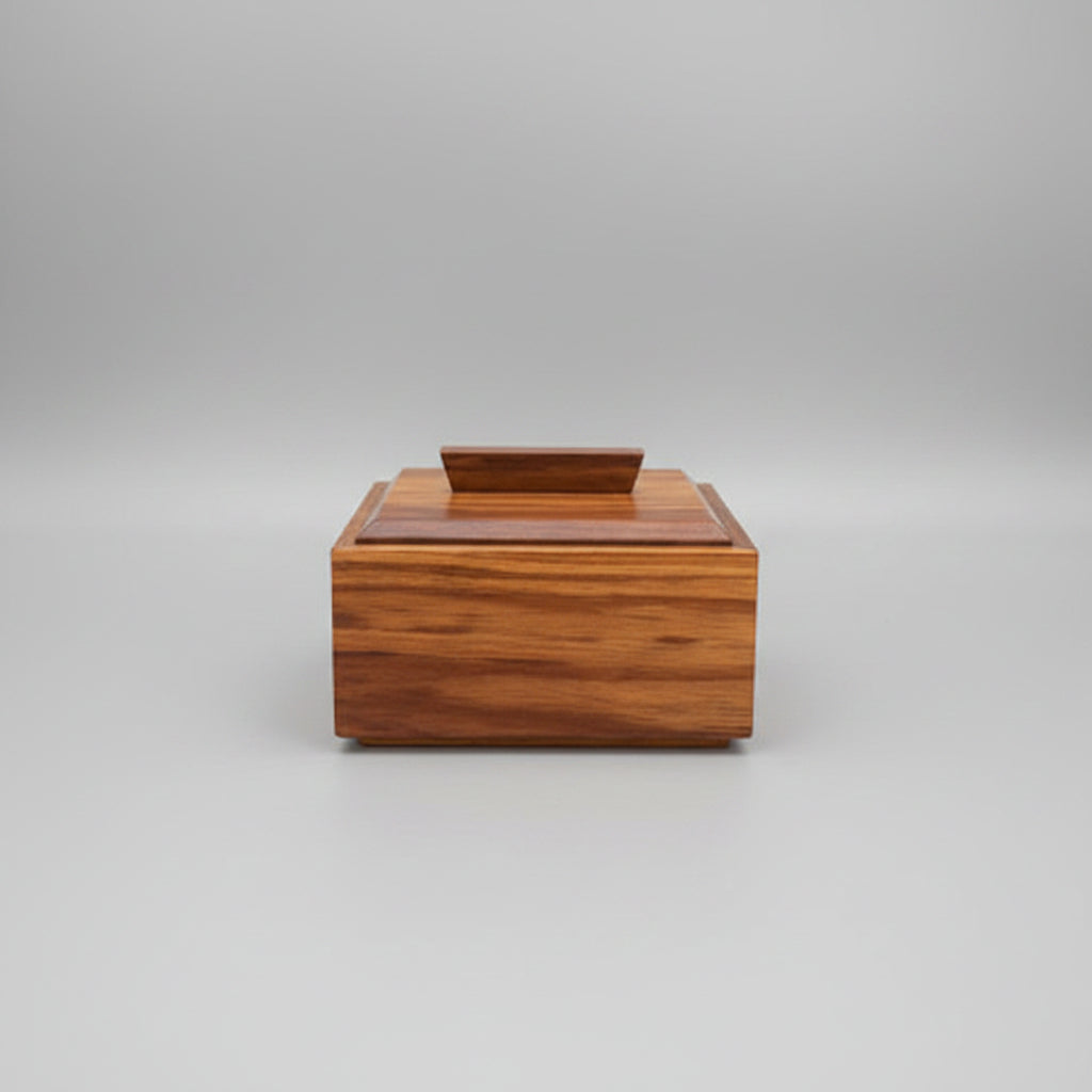 Wooden box on a wooden surface with a dark background