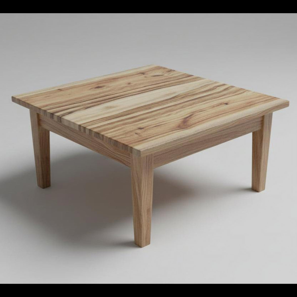 Square Camphor Laurel coffee table with natural wood grain, custom Australian timber furniture.