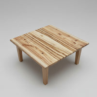 Wooden stool on a wooden floor