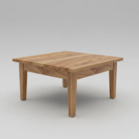 Wooden coffee table in a living room with chairs and a lamp in the background.