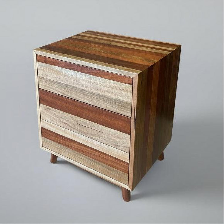 Wooden side table with striped pattern on a gray background