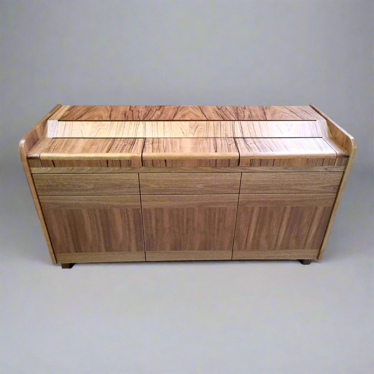 Wooden sideboard with a zebra wood pattern on a plain background
