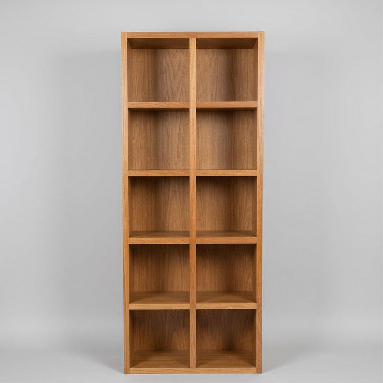 A Spotted Gum Pigeon Hole Unit with multiple shelves, featuring a backing and Spotted Gum beading on the front, placed in a showroom setting with various cushions on top.